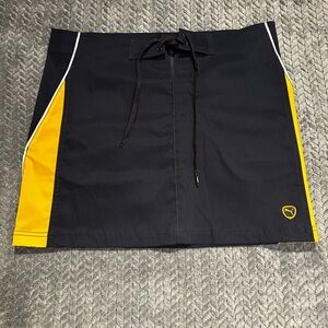 Puma Women’s  Navy Mini Skirt with Yellow Side Panels Size L